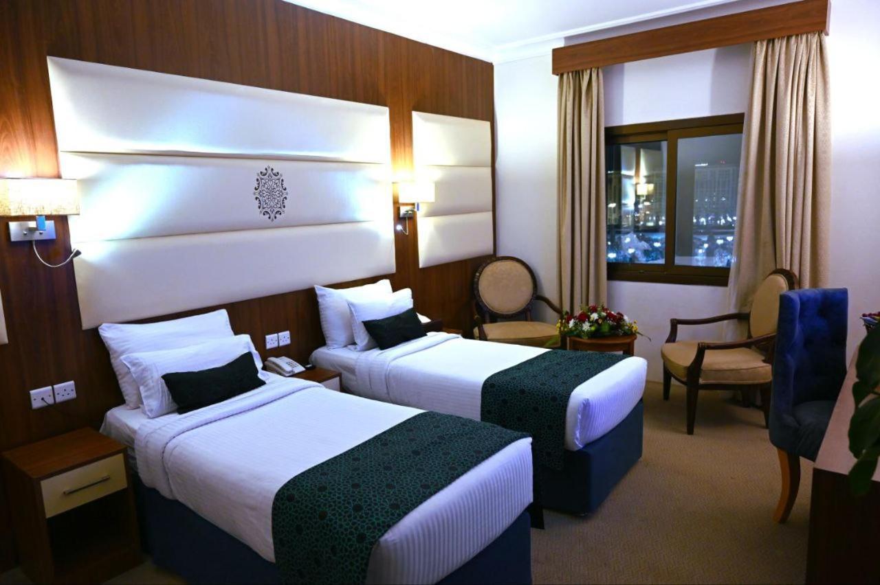 One Inn Hotel Медина Экстерьер фото