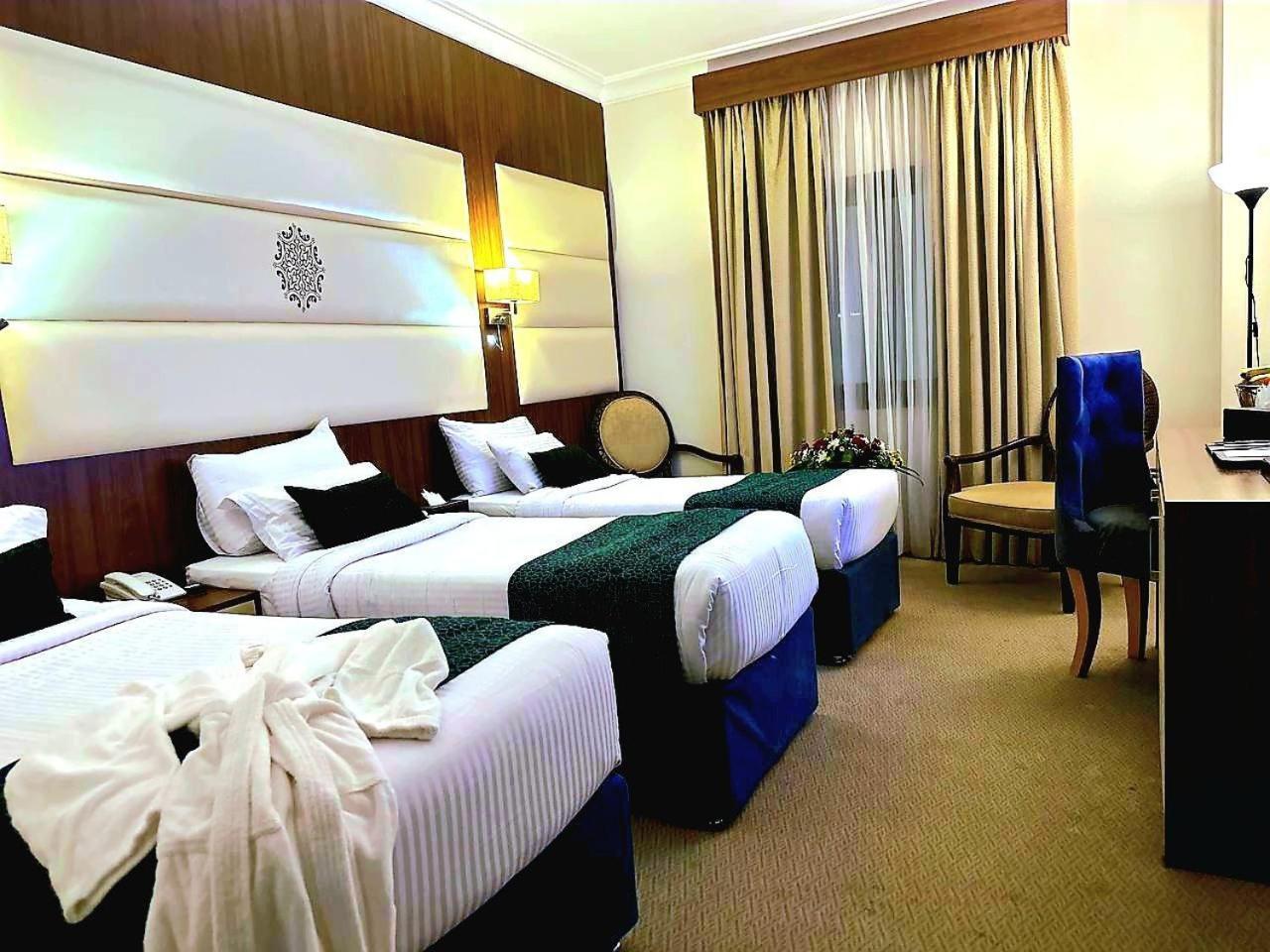 One Inn Hotel Медина Экстерьер фото