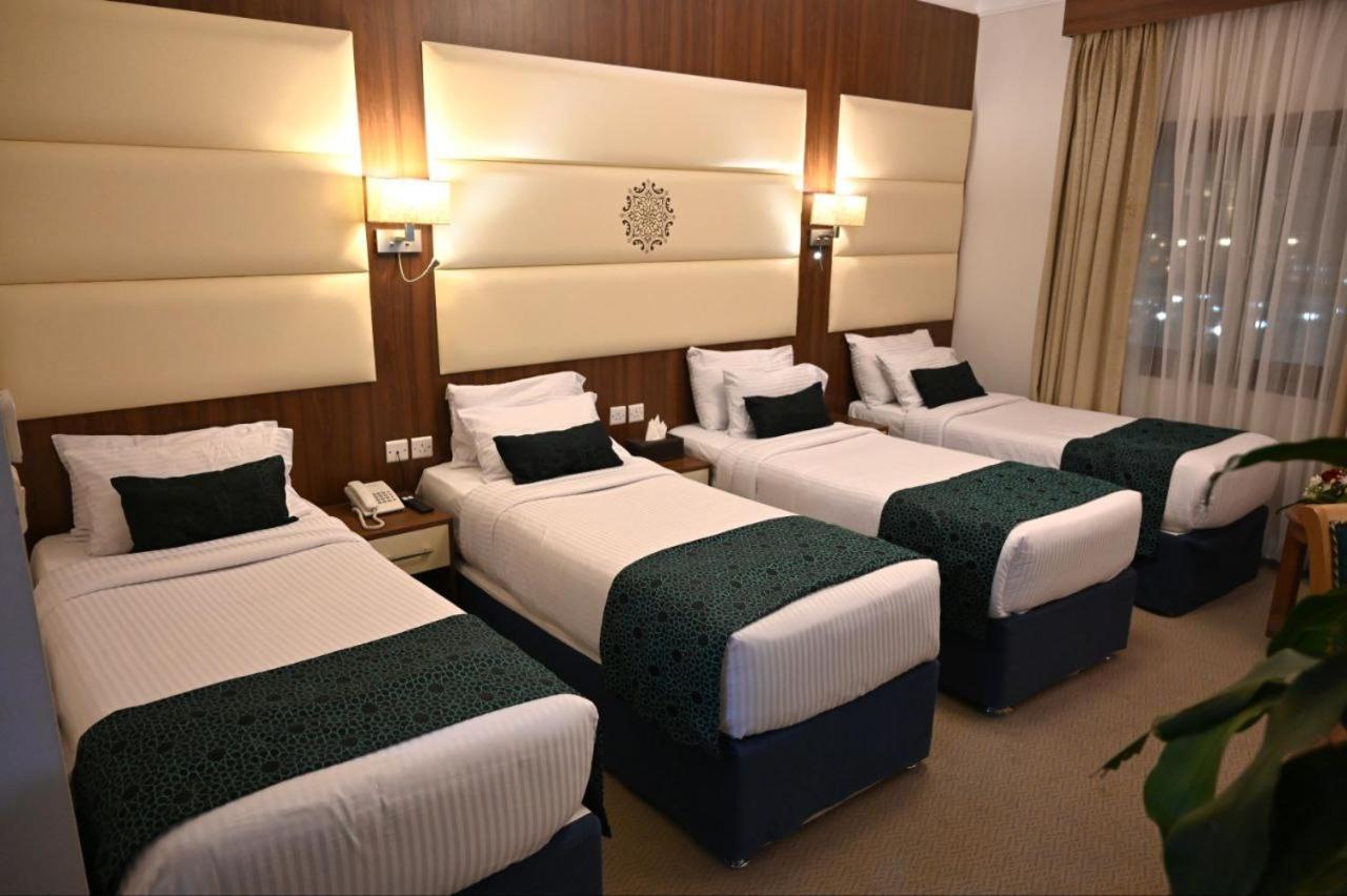 One Inn Hotel Медина Экстерьер фото
