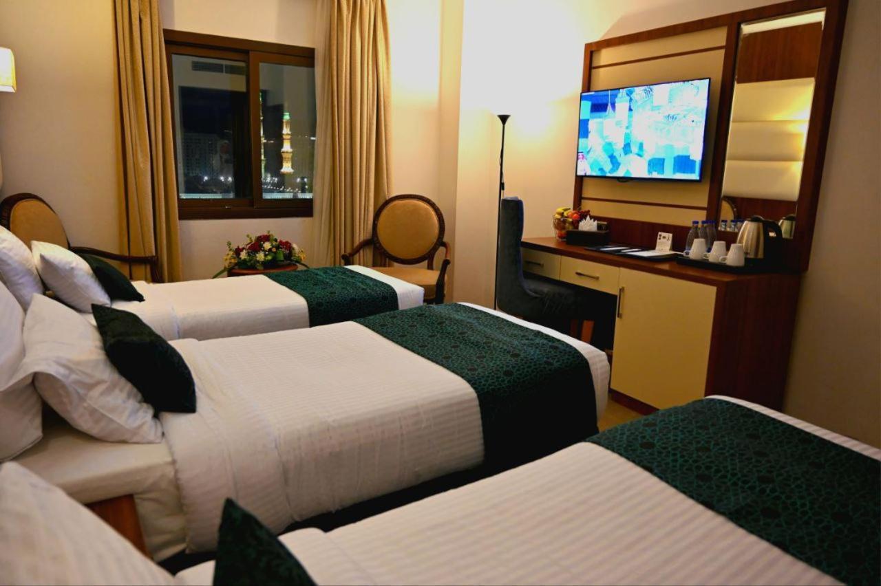 One Inn Hotel Медина Экстерьер фото