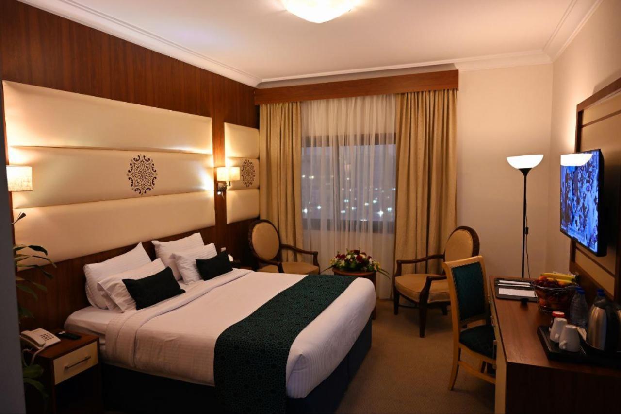 One Inn Hotel Медина Экстерьер фото